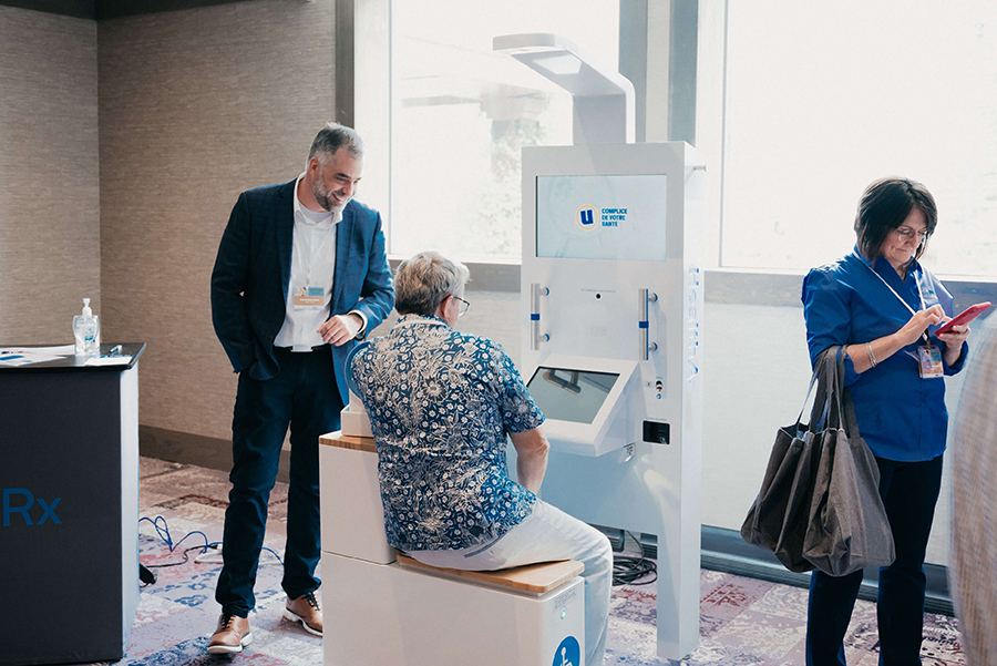 woman at self-healthcare-kiosk